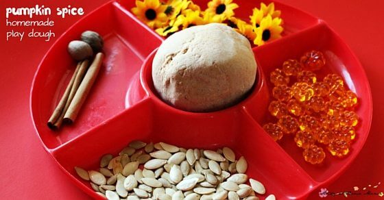 Pumpkin Spice Play Dough - easy homemade play dough recipe used in a pumpkin patch play dough invitation. A wonderful and amazing smelling fall sensory activity for kids.