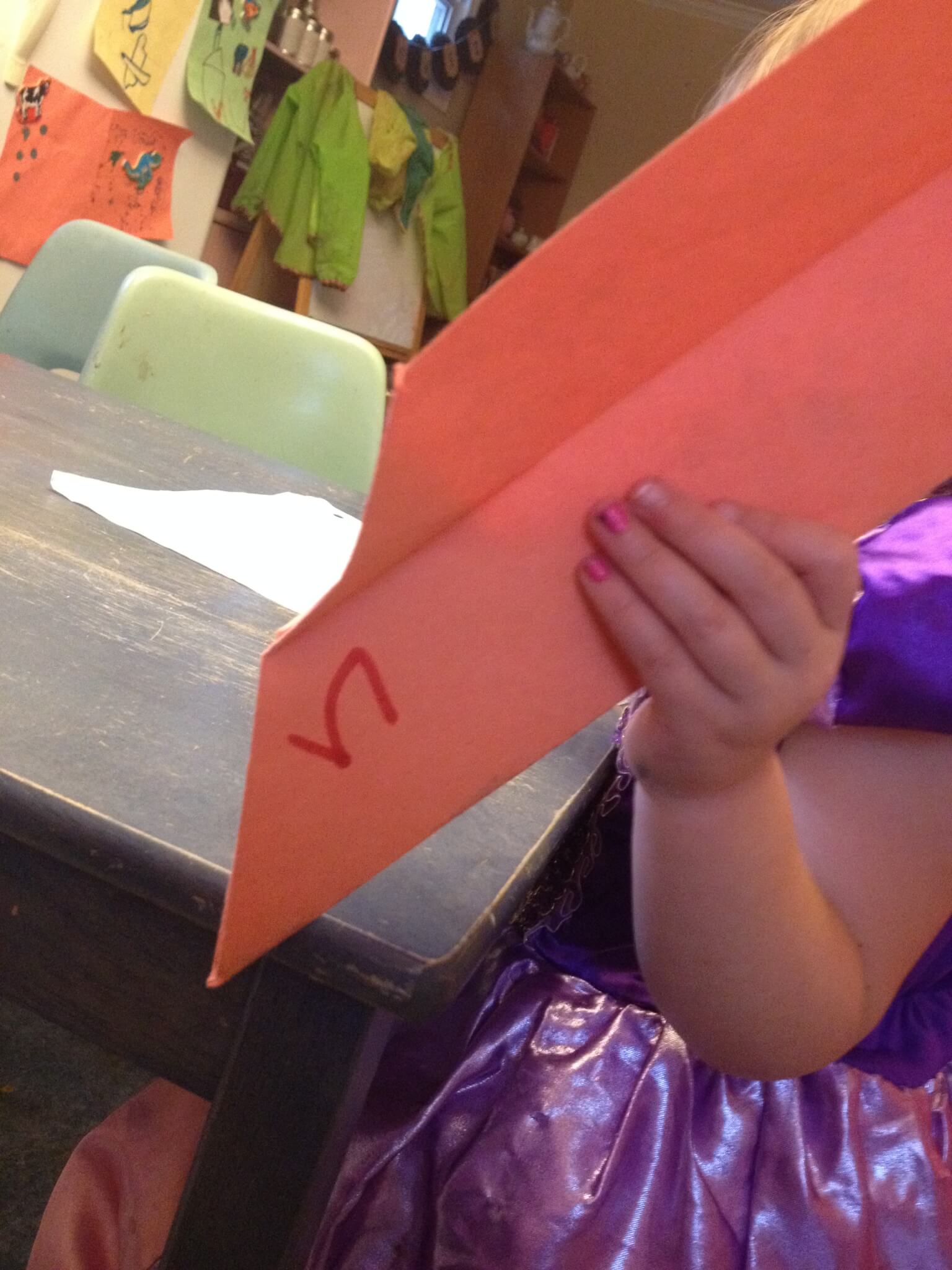 making paper airplanes for learning the letter "n"