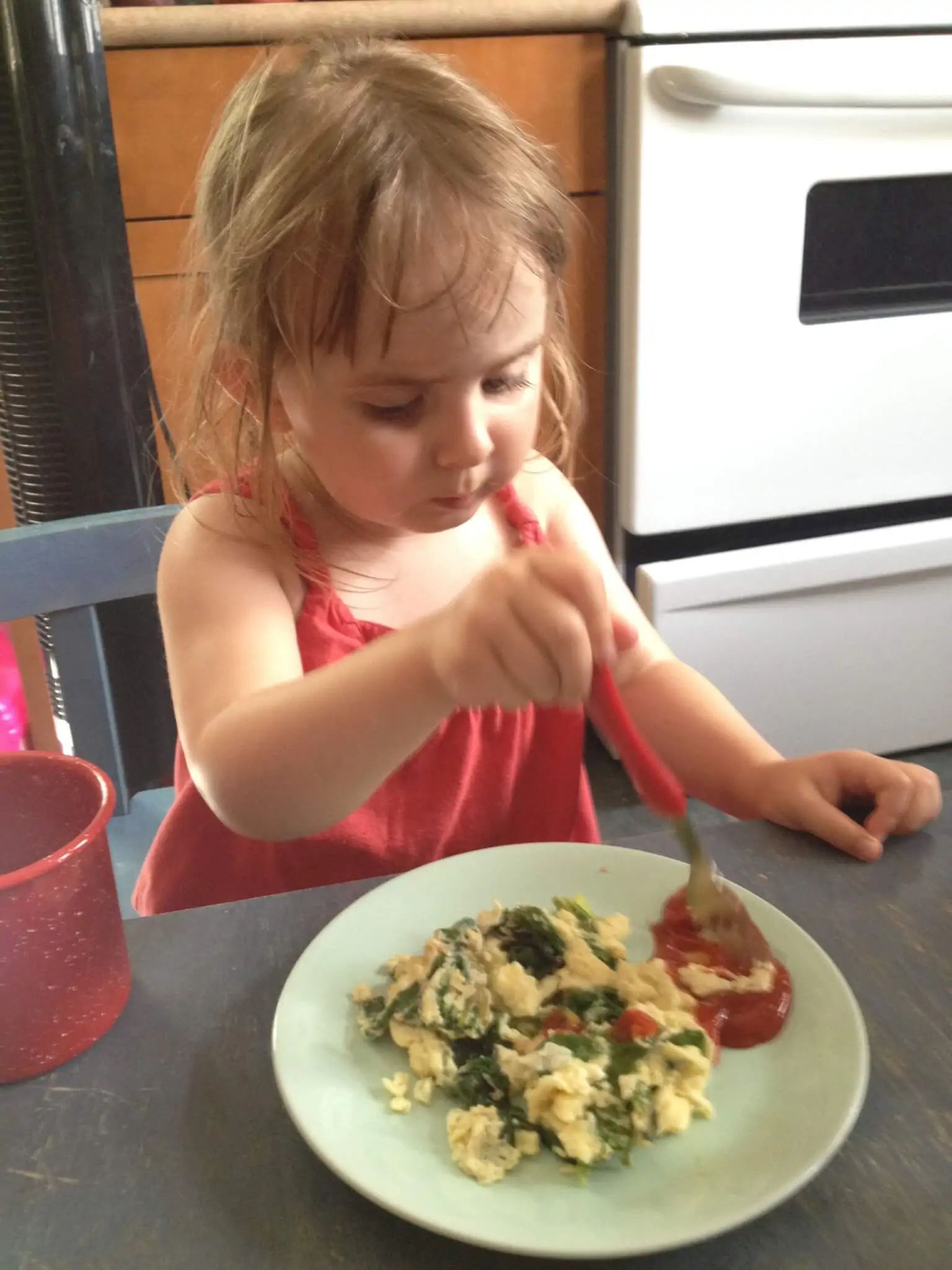 healthy green eggs for kids in the kitchen