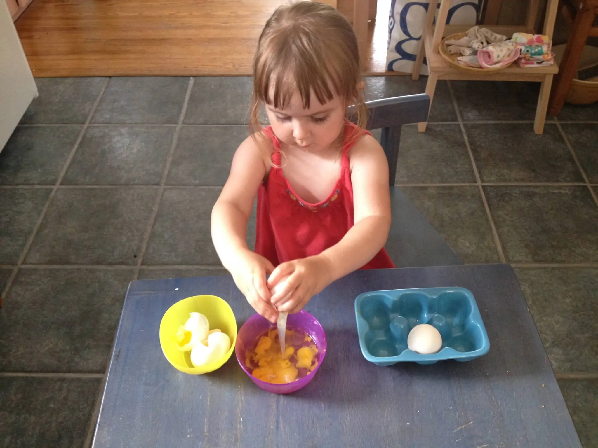 Making green eggs after reading Dr. Seuss's green eggs and ham