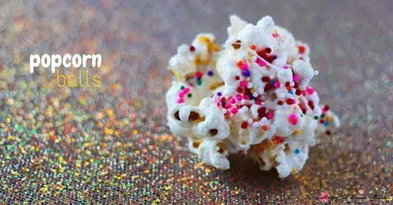 A fun and easy party food for kids - popcorn balls take less than 5 minutes to make, and are easy enough to be a kids' kitchen project. Popcorn balls are a fun lunch box idea for birthday lunches.