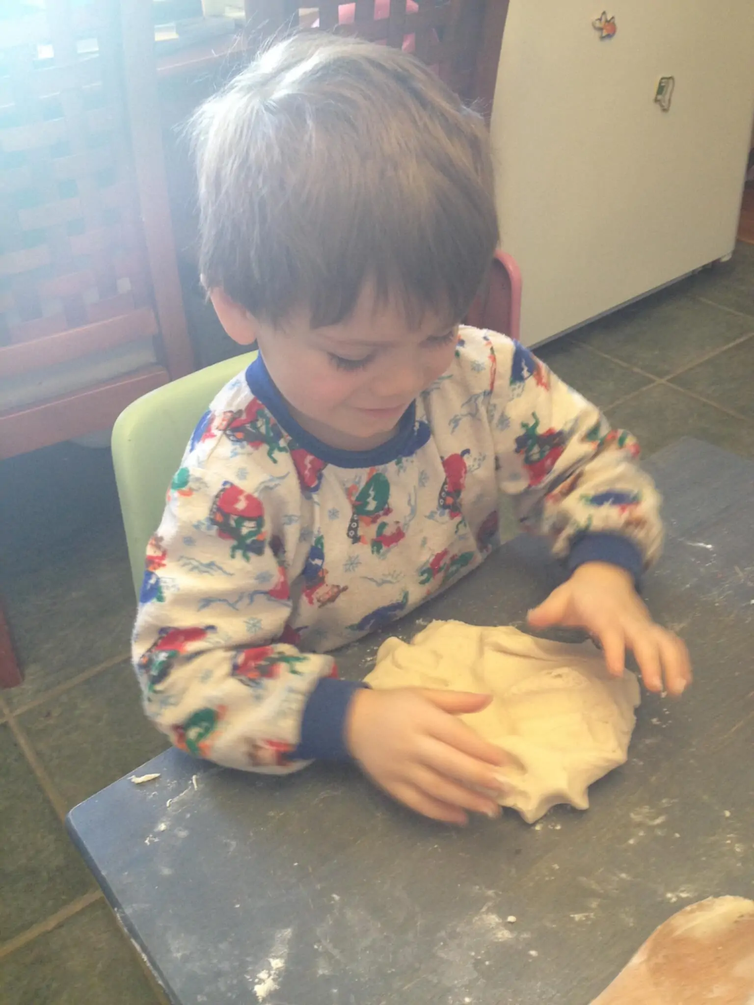 Let kids help make homemade play dough - an amazing play recipe with great sensory benefits!