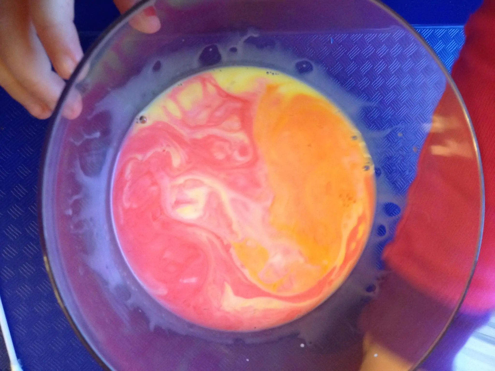 milk and dish soap experiment: after the colours settle, you get this fun marbled effect that can be used as paint