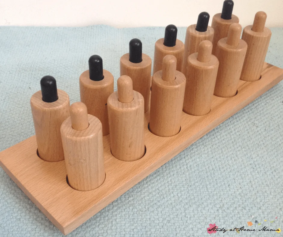 Pressure Cylinders, part of a Budget-priced Montessori Sensorial Materials Review (Part 2): You don't need to buy premium Montessori materials in order to expect quality. This Montessori teacher shares the materials she likes from discount Montessori retailers, and which Montessori materials to avoid!