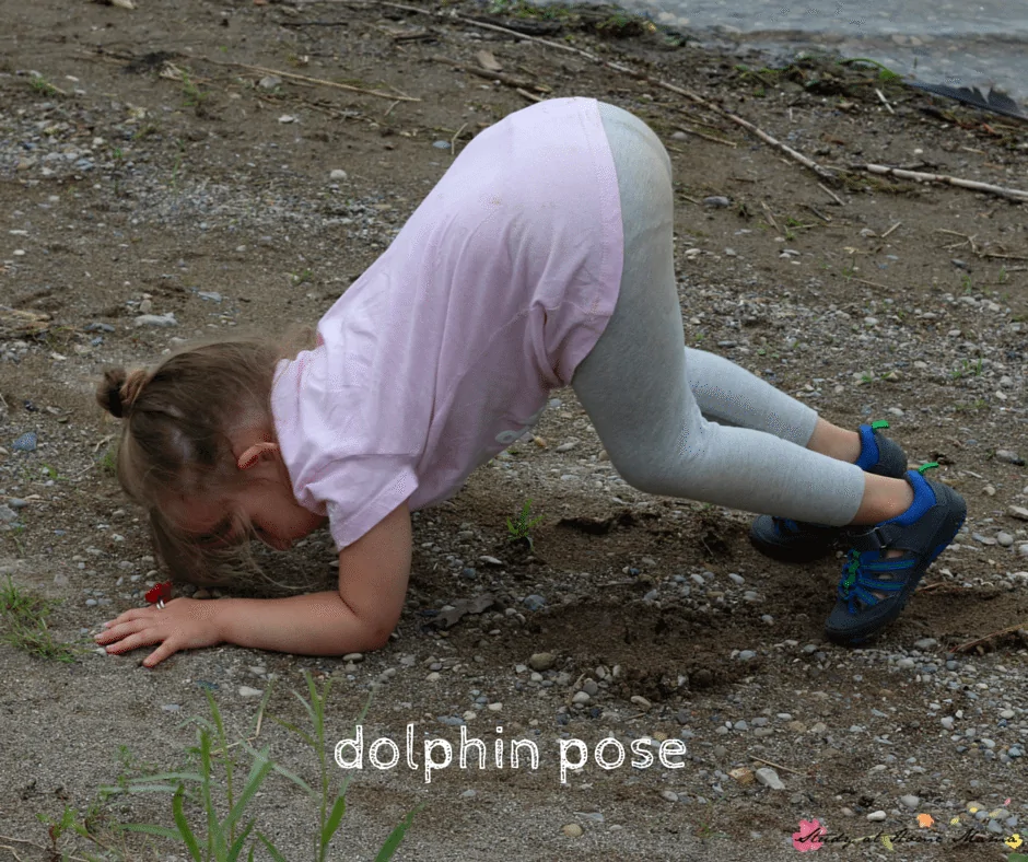 Dolphin pose  is a great yoga pose for kids and part of this beach-themed yoga sequence for kids