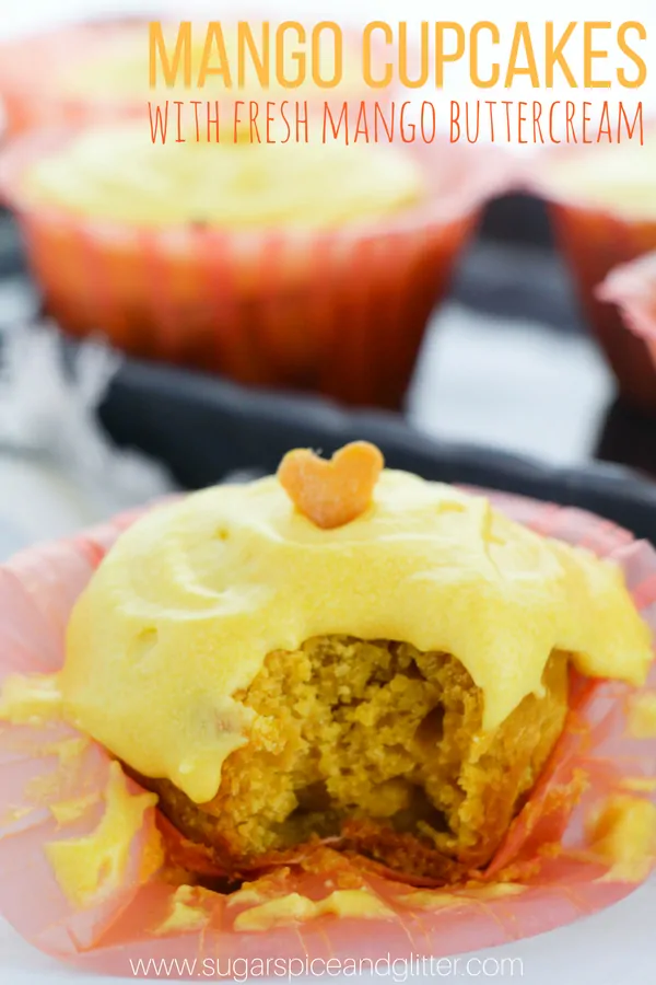 A bright and tropical mango cupcake recipe made with fresh mangoes and topped with a fresh mango buttercream. This recipe is also vegan and dairy-free!