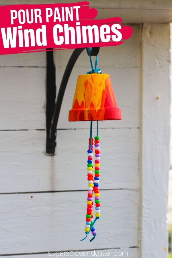 A fun process art craft for kids that results in a beautiful homemade wind chime, these Garden Wind Chimes use an old potting plant, almost-finished bottles of paint and whatever pretty things you have lying around