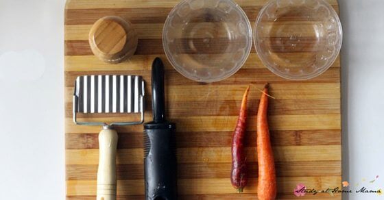Montessori Practical Life Lesson: Teaching Children how to safely cut carrots is an empowering kids kitchen skill that can be daunting for parents. Trusting your child with real tools builds responsibility & confidence, if done the right way.