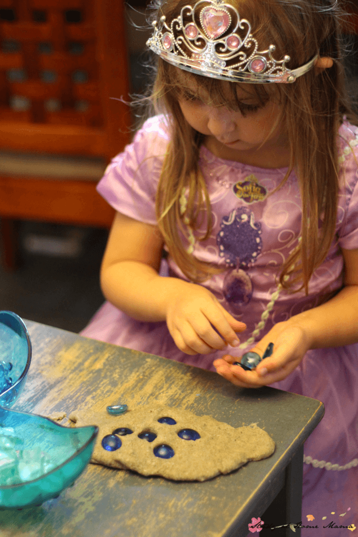 Providing "treasure" along with a mermaid play dough invitation encourages children to explore early math and literacy concepts while having fun with this easy sensory activity for kids