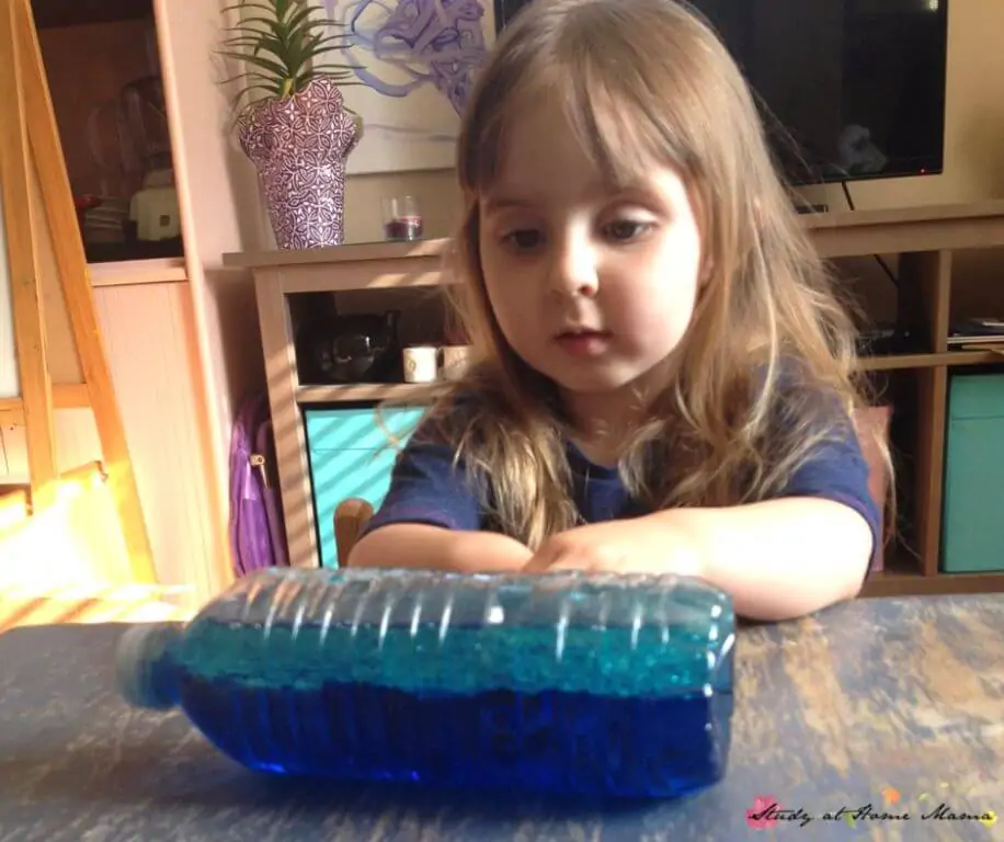 Make your own wave in a bottle science experiment using oil and water!