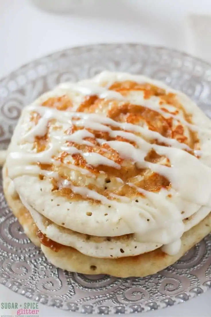 Oh yum - that cream cheese drizzle, the cinnamon-sugar swirl. These cinnamon bun pancakes look amazing! Definitely making these for my next brunch guests.
