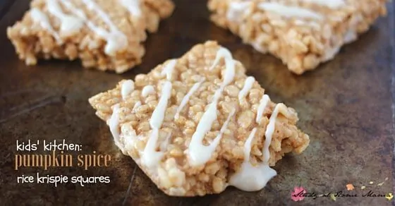An easy kids' kitchen recipe, these pumpkin spice rice krispie treats can be ready in less than 10 minutes, made with real pumpkin & a cream cheese drizzle