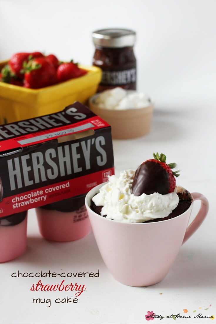 One-Minutes Chocolate-Covered Strawberry Lava Mug Cake - so much deliciousness in one mug! Cake, pudding, and chocolate-covered strawberry, oh my.