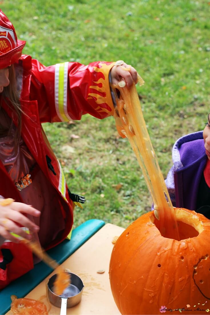 Stretch! Pumpkin slime is a great fall sensory play invitation for kids who love messy play
