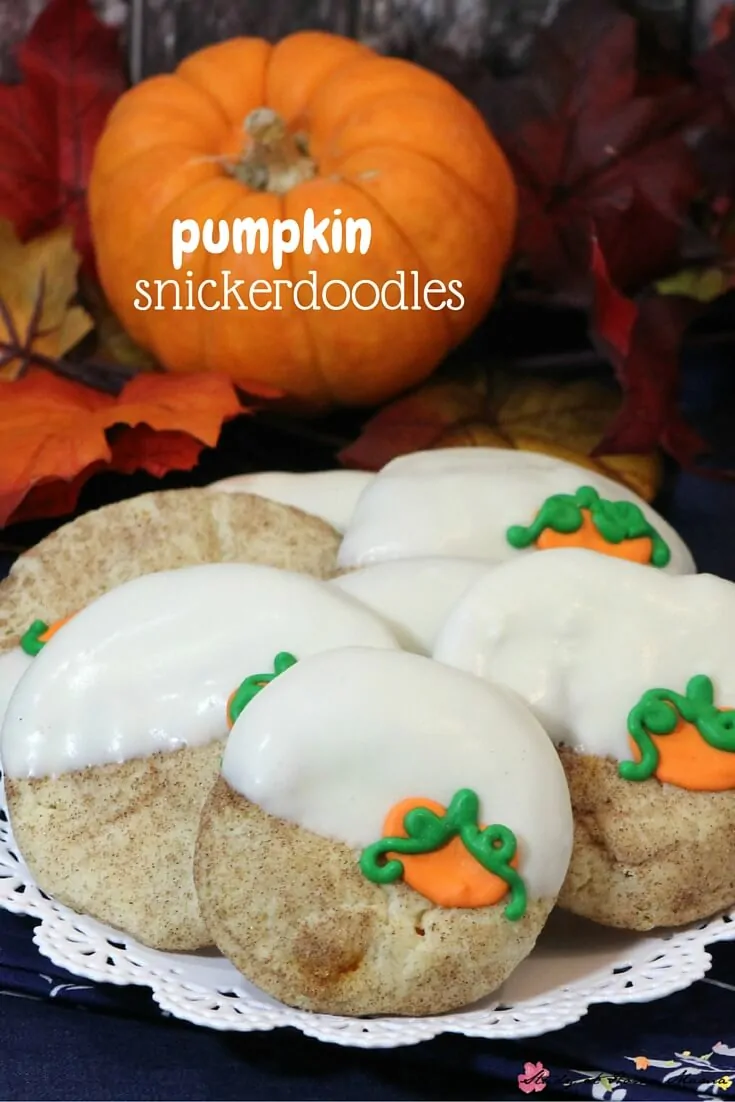 Pumpkin snickerdoodles - an easy dessert for fall, pumpkin spice snickerdoodle cookies with a white chocolate dip and pumpkin embellishment. They look fancy, but are super easy and taste much better than most fancy cookies you see on Pinterest