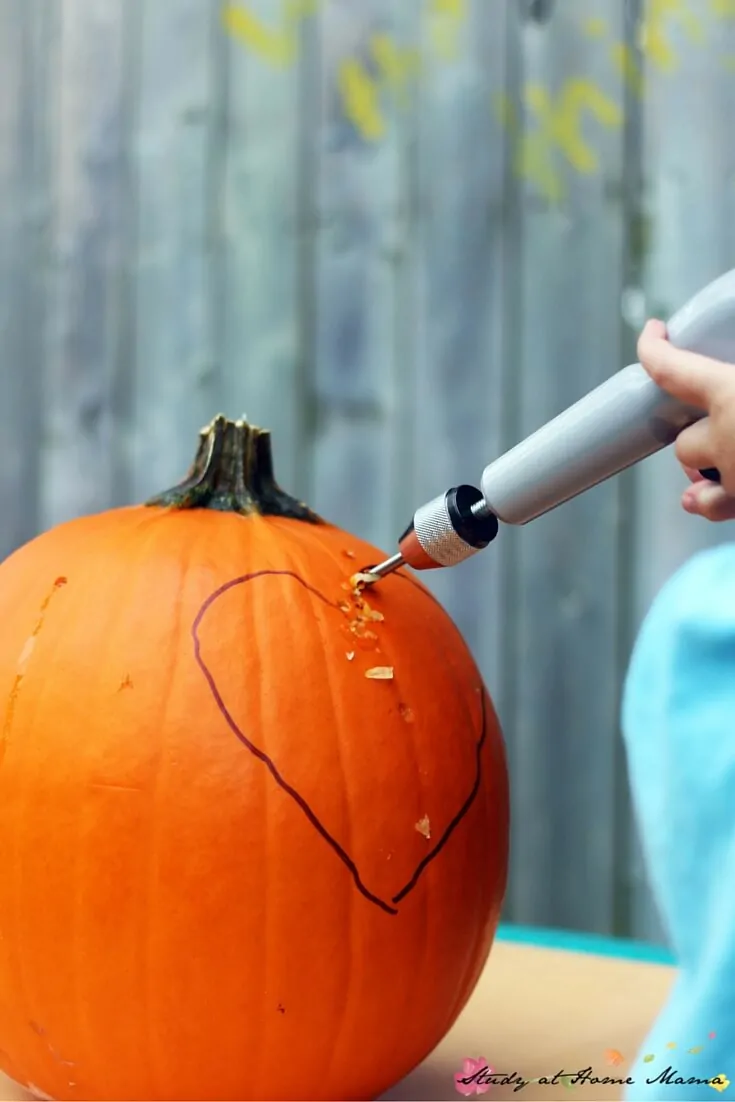 Pumpkin Carving that kids can do - use a manual drill to allow children to help "carve" a pumpkin