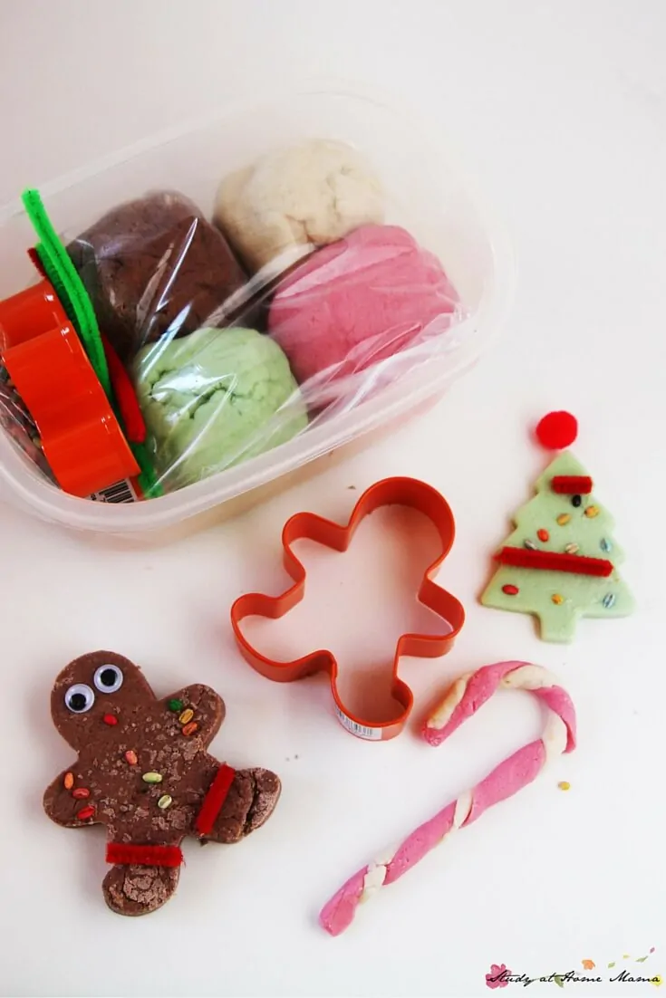 Homemade Christmas Play Dough Kit - a fun and useful homemade gift for kids, this homemade play dough kit engages fine motor muscles and creativity at the same time! Super easy and cheap to put together if you're making gifts for a large group