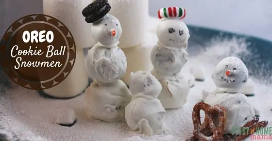 OREO Cookie Ball Snowmen - a fun twist on a classic Christmas cookie. Make a winter scene with the kids - a marshmallow igloo, a pretzel sled, the sky's the limit. Use flavoured OREOs for an extra holiday twist.
