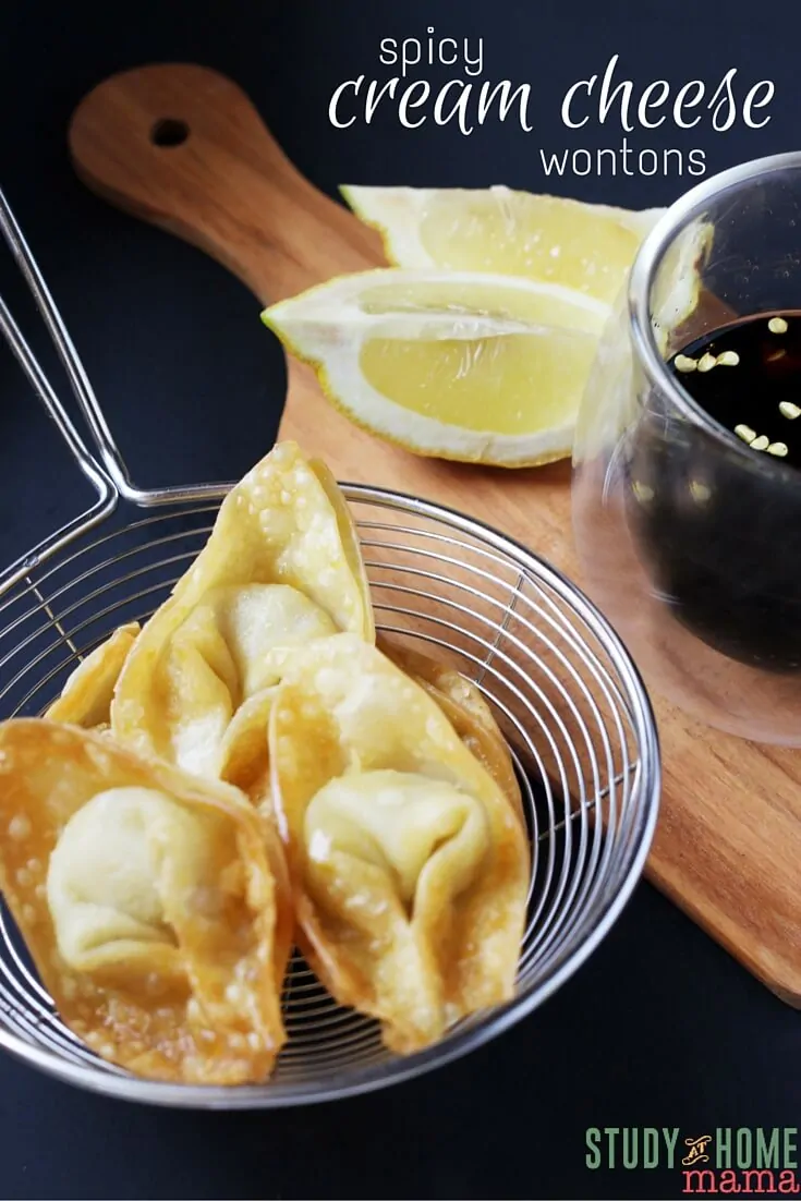 These Spicy Cream Cheese Wontons are an easy appetizer your guests will love! Sriracha is adds just enough spicy for a flavor explosion without being overpowering. Warm wonton dip is a must for this yummy cream cheese based side. 