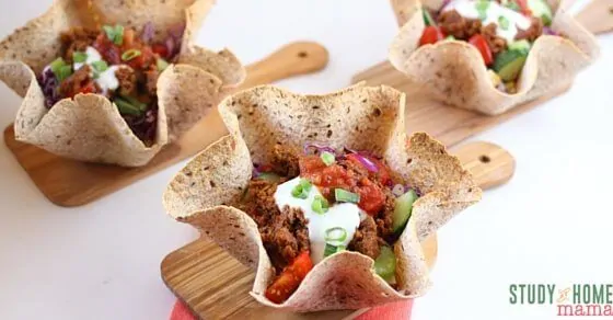 A healthy taco salad recipe that will satisfy your Taco night craving with healthy swaps that don't compromise on flavor! A healthy meal idea your whole family will love with tons of veggies to boot!