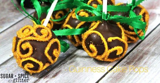 Guinness Chocolate Cake Pops on Sugar, Spice & Glitter are the perfect Irish dessert. Bursting with flavour in a rich bite sized dessert you'll love sharing them at your next St. Patrick's Day party. 