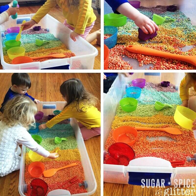 This rainbow sensory bin is made from dyed pearl barley - a perfect rainbow sensory activity for St Patricks Day