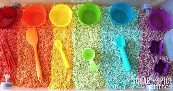 A silky and gorgeous Rainbow Sensory Bin for kids, this rainbow barley bin is perfect for mixed age groups. Add rainbow-coloured kitchen tools to encourage pretend play and fine motor skill building