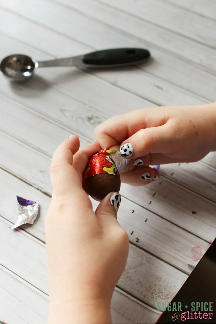 Peeling cream eggs for the cake is a great fine motor activity for kids