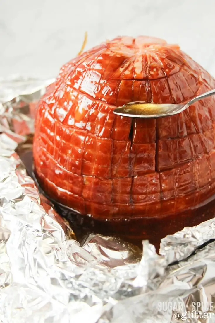 Honey-caramel ham recipe - an amazing Easter ham recipe that will convert anyone to a ham-lover! Would you just look at that gorgeous glaze, how is this recipe going to be anything other than amazing with that being poured on it?