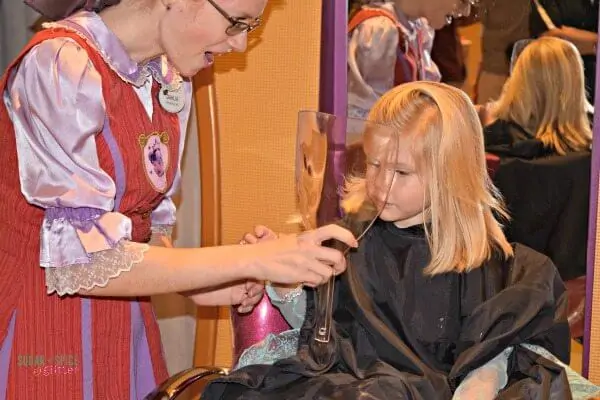 Overwhelmed and sensory overloaded after an unexpected experience at the Bibbidi Bobbidi Boutique at Walt Disney World. 