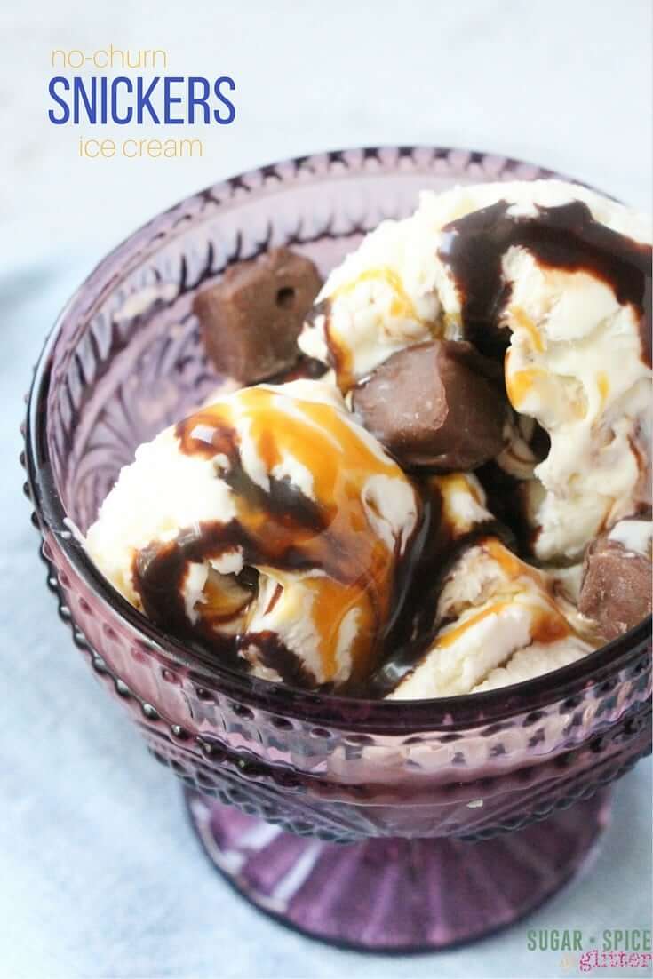 Homemade no-churn Snickers Ice Cream recipe with deep ripples of chocolate and caramel with little bite-sized Snickers folded into the ice cream. Takes less than 10 minutes to make, and is ready to eat in 2 hours