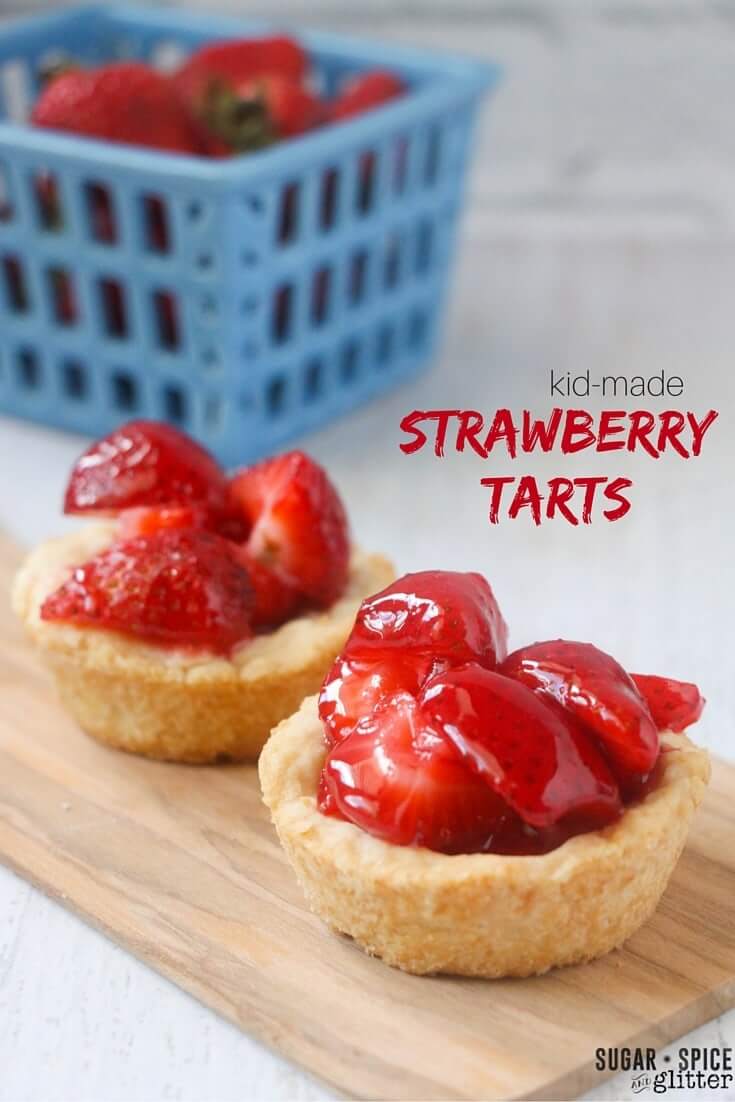 These are the perfect kid-made strawberry tarts, with a fail-proof pie crust and easy glaze. The buttery crust melts in your mouth without bing crumbly, while the strawberries remain crisp and juicy while covered in that perfectly-sweet glaze.