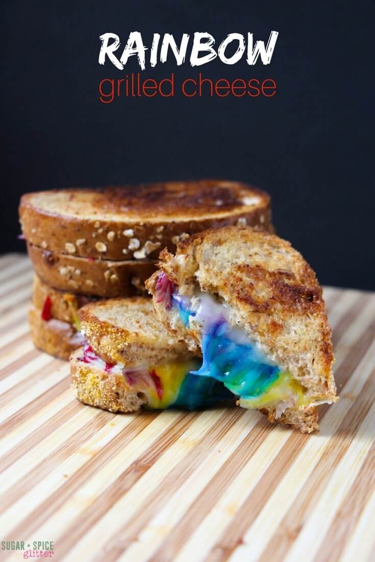 This is the sandwich you've been waiting your whole life to make. A grilled cheese sandwich that puts all others to shame - this rainbow grilled cheese is gorgeous and decadent, with two layers of ooey-gooey multicolored cheese sandwiched in between perfectly toasted artisanal bread.