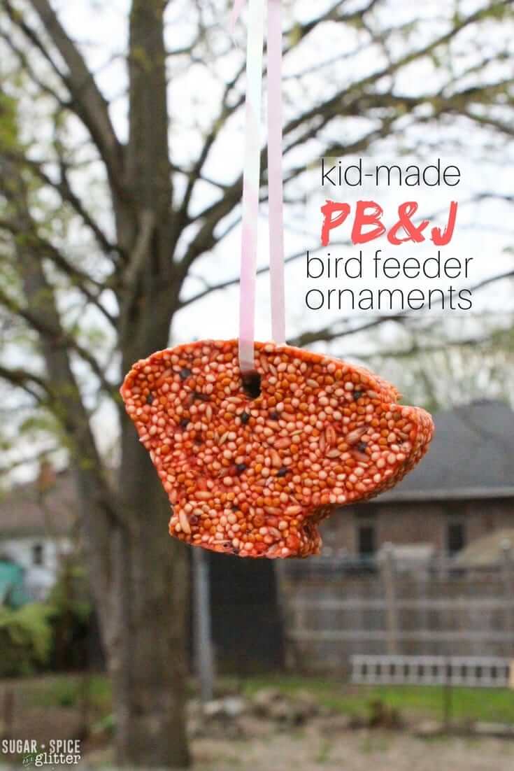 How cute are these kid-made bird feeder ornaments made in cookie cutter shapes! This recipe is super easy for kids to take the reigns with - and veterinarian-approved