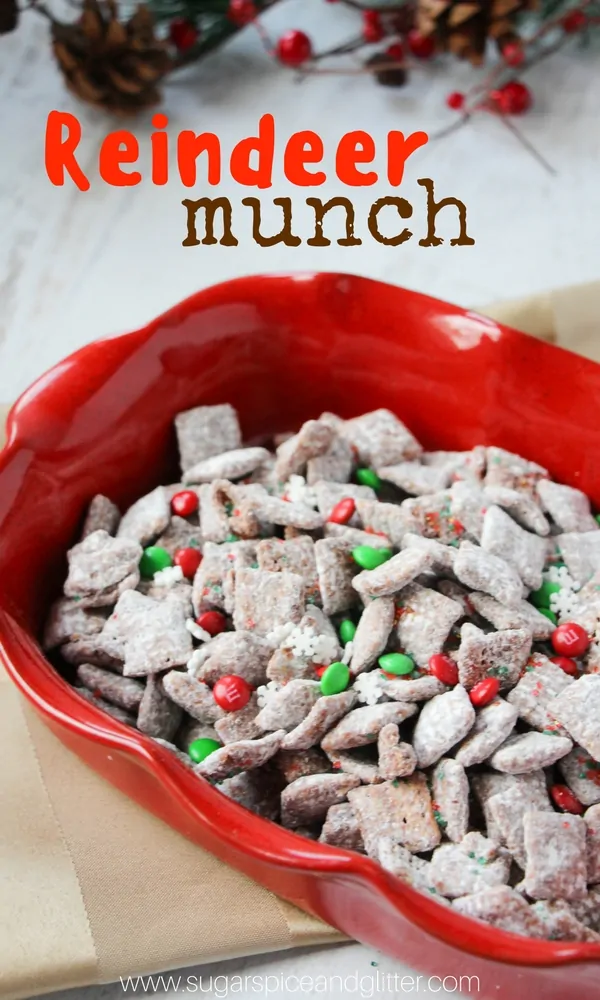 A delicious sweet party mix for Christmas, this crunchy peanut butter and chocolate "reindeer chow" is so incredibly delicious and addictive! Add Christmas M&Ms for a festive touch.