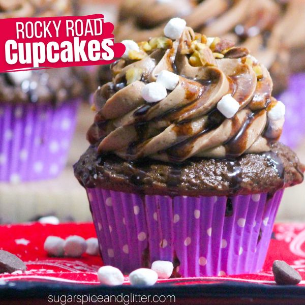 Rocky Road Cupcakes are a crowd pleaser, for sure! Creamy, homemade frosting with the perfect rocky road mix everyone loves. And the presentation has the wow factor you will love!