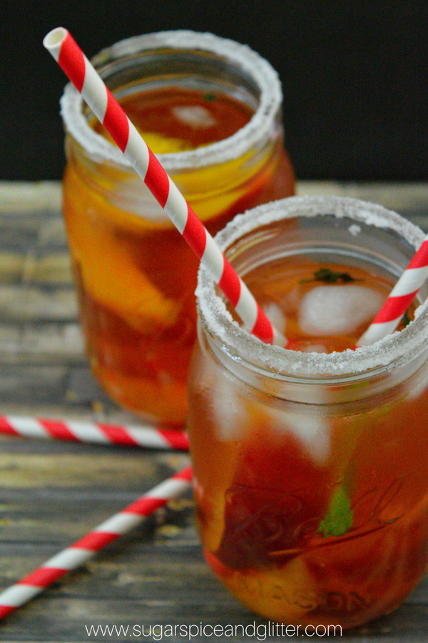 A fruity, caffeine-free peach mint iced tea, this delicious summer drink is non-alcoholic and perfect for kids