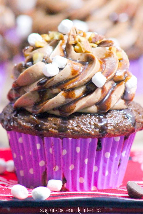 Creamy, homemade frosting with the perfect rocky road mix everyone loves makes these Rocky Road Cupcakes a crowd pleaser. And the presentation has the wow factor you will love!