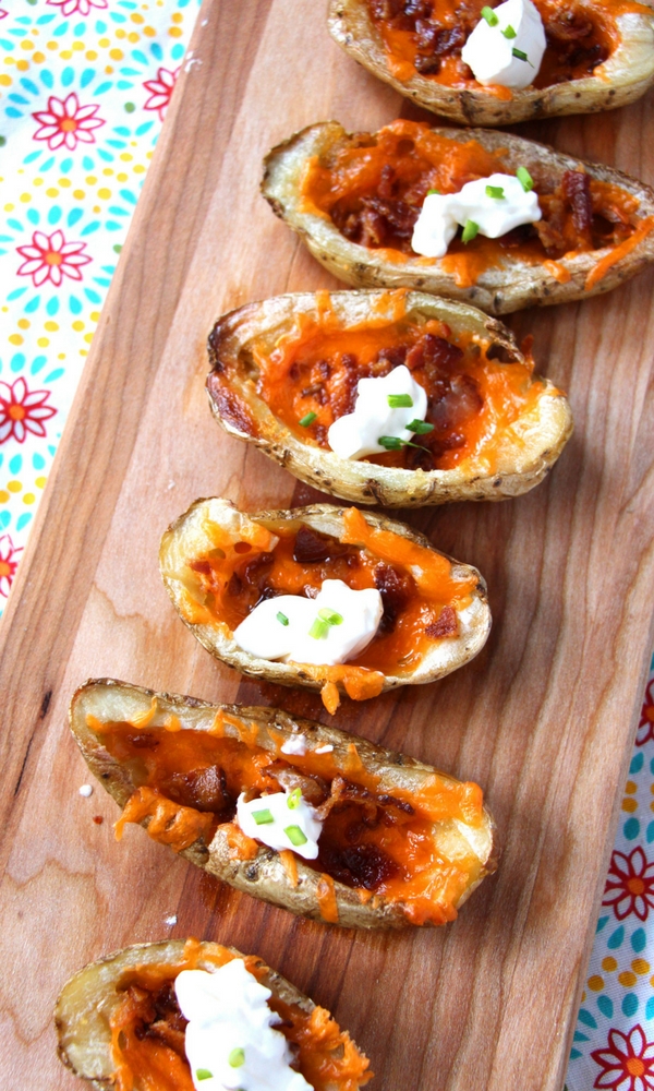 Fully loaded baked potato skins - an easy appetizer recipe that tastes absolutely restaurant quality