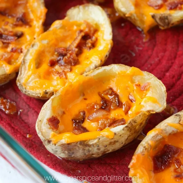Crispy baked homemade potato skins with cheese and bacon