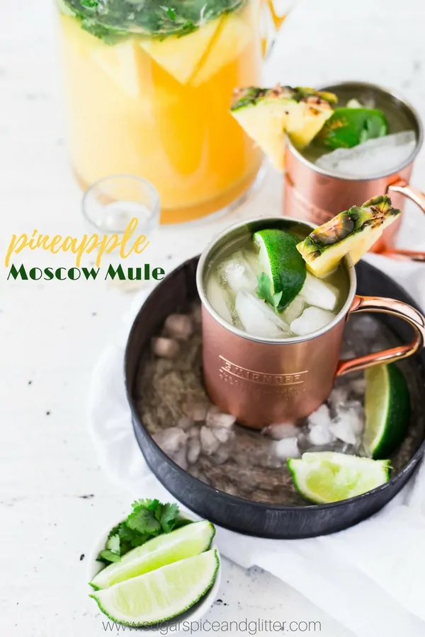 This delicious pineapple vodka cocktail is perfect for summer - a Pineapple Ginger Moscow Mule made with fresh fruit and cilantro