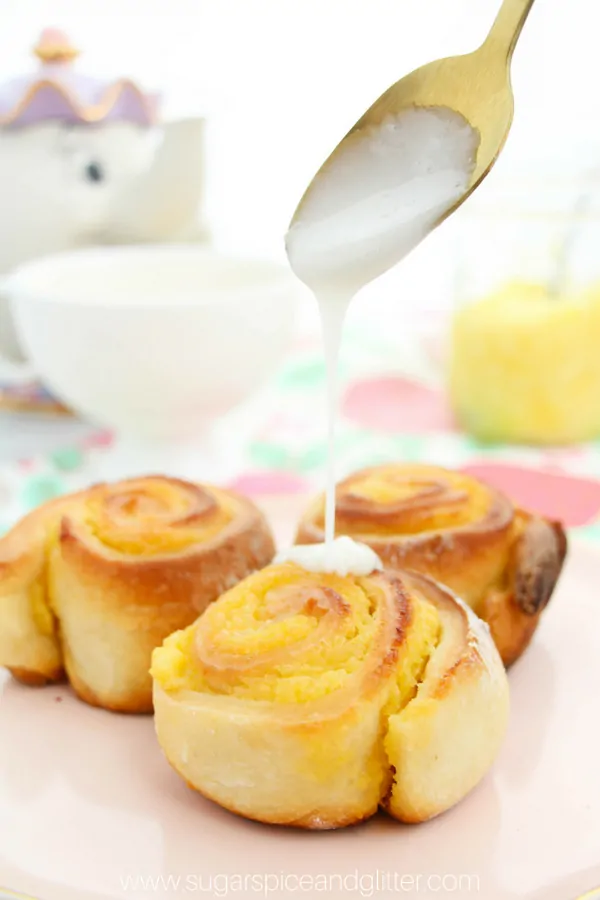 Having friends for tea? Be sure to serve this lemon sticky roll recipe, a light and bright treat everyone will love