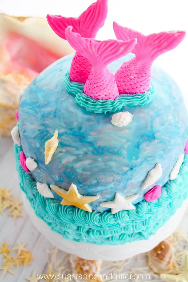 A fun and easy DIY mermaid birthday party cake using a mixture of fondant and buttercream icing. This cake is easy enough for beginners but looks professional