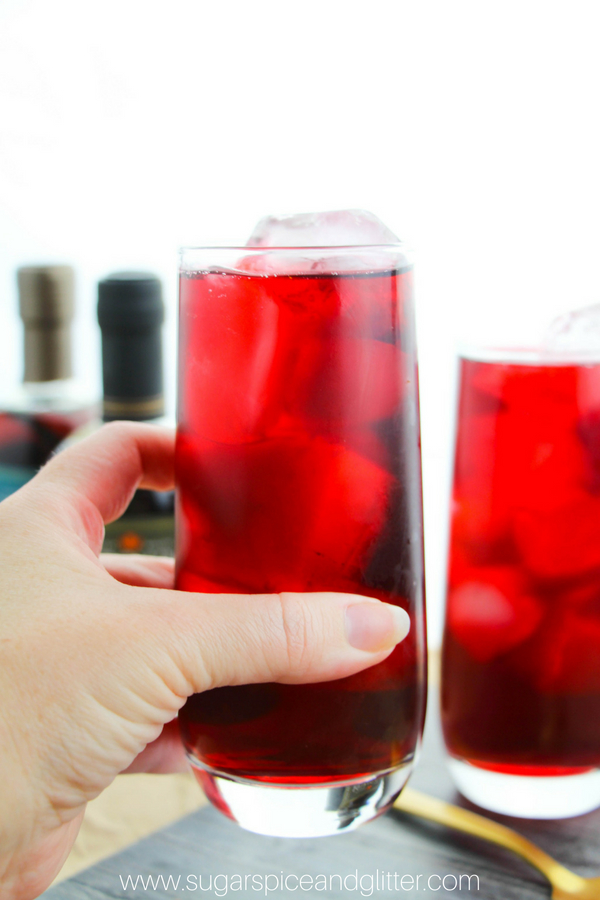 An unexpected herbal iced tea made with hibiscus flowers, raspberries, and maple syrup