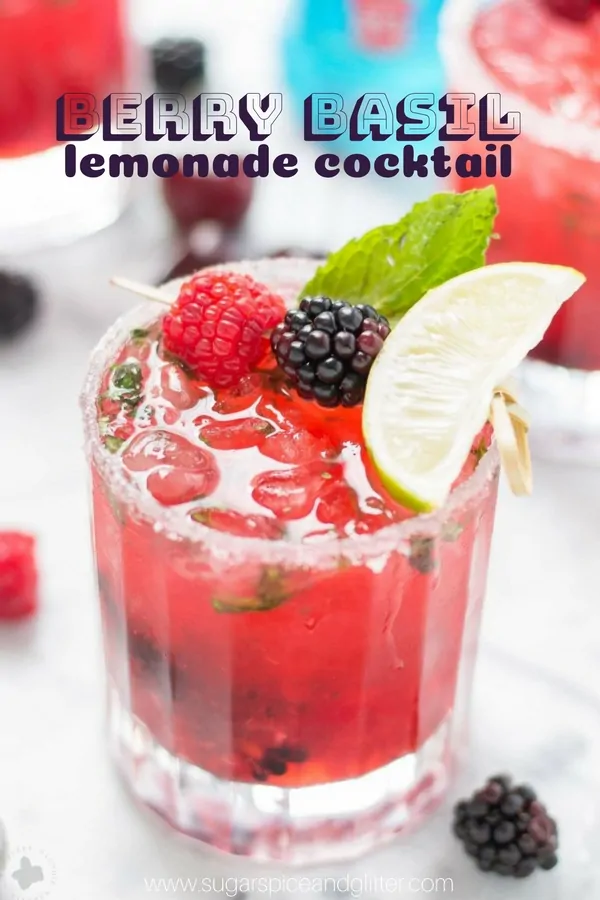 A delicious berry lemonade cocktail recipe using vodka and homemade basil simple syrup - the perfect summer cocktail recipe!