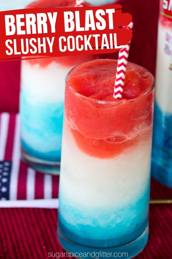 A delicious slushy cocktail recipe for Smirnoff's Red White and Berry Blast vodka made with fresh strawberries, lemonade and blue curacao. Perfect for Memorial Day or 4th of July parties!