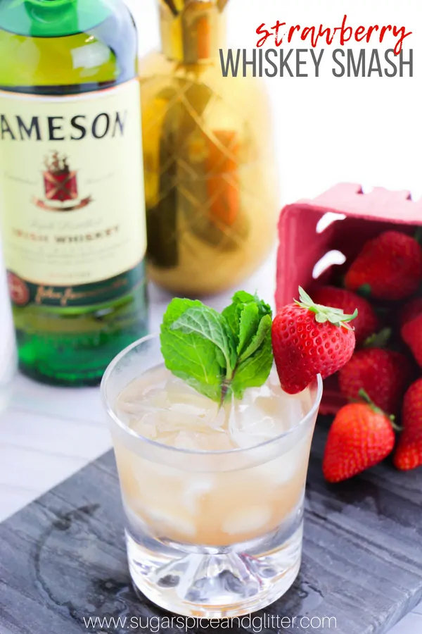 A smooth and fruity whiskey drink that even non-whiskey drinkers will enjoy, this Strawberry Whiskey Smash tastes like a strawberry lemonade - for grown-ups only!