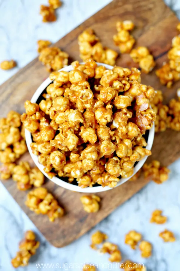 A delicious and easy Homemade Salted Caramel Popcorn recipe is the perfect fall dessert for a Halloween party