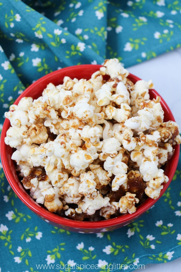 A fun homemade popcorn recipe for cinnamon bun fans, this Cinnamon Bun Popcorn is a great addition to your next family movie night