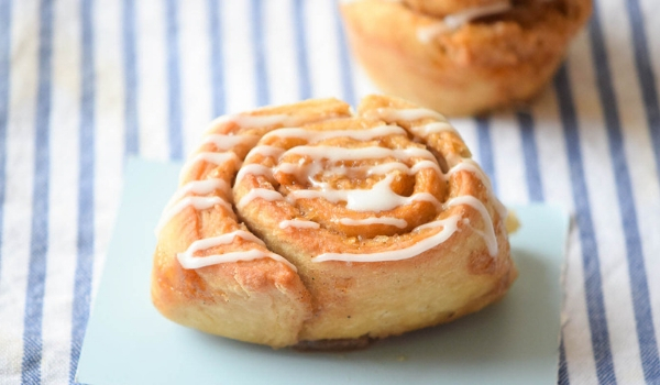 pumpkin spice latte rolls on a blue lined napkin